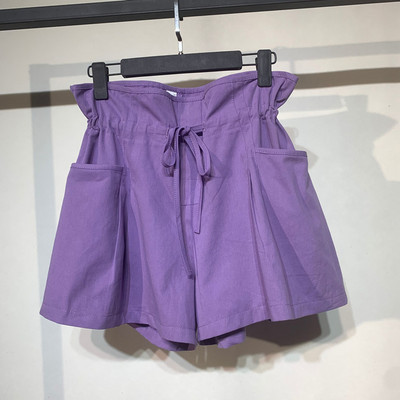 Pantaloni de damă cu legături în talie și buzunare