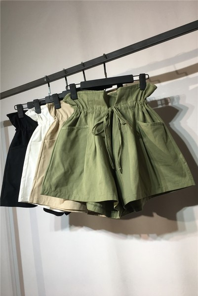 Pantaloni de damă cu legături în talie și buzunare