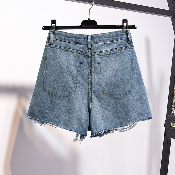 Model nou de pantaloni scurți din denim cu motive rupte în negru și albastru