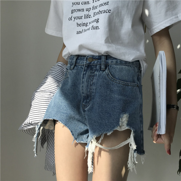 Pantaloni din denim cu elemente rupte - model asimetric