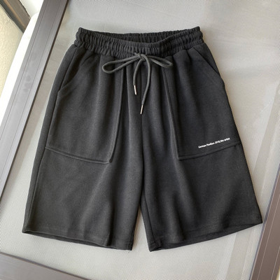 Φαρδιά παντελόνια πάνω από το γόνατο με τσέπες - μοντέλο unisex