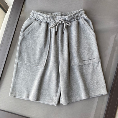 Φαρδιά παντελόνια πάνω από το γόνατο με τσέπες - μοντέλο unisex