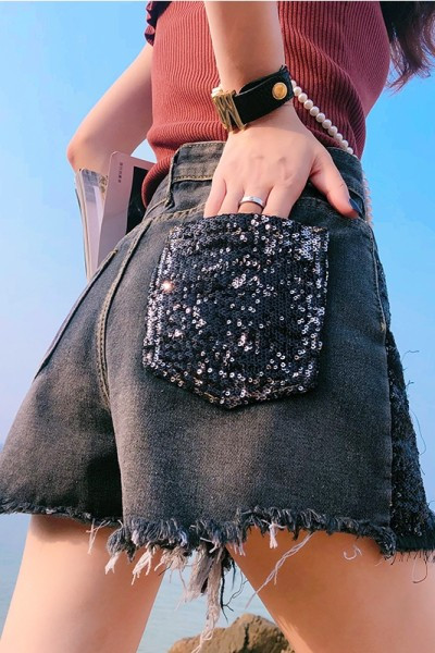 Uus mudel taskutega ja läikiva efektiga naiste teksapüksid