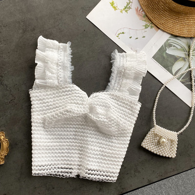 Γυναικείο αμάνικο από δαντέλα με βολάν