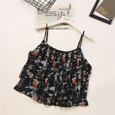 Ženska majica bez rukava s tankim naramenicama i cvjetnim motivima