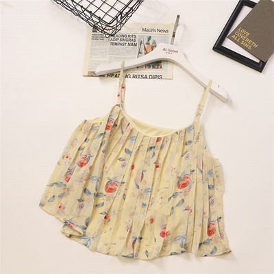 Ženska majica bez rukava s tankim naramenicama i cvjetnim motivima