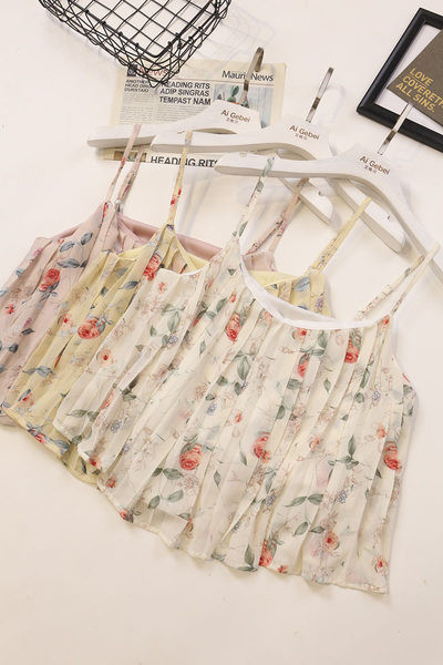 Ženska majica bez rukava s tankim naramenicama i cvjetnim motivima