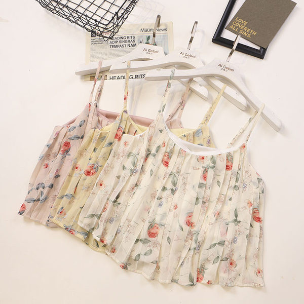 Ženska majica bez rukava s tankim naramenicama i cvjetnim motivima