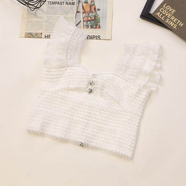 Top de damă actual cu nasturi și tul