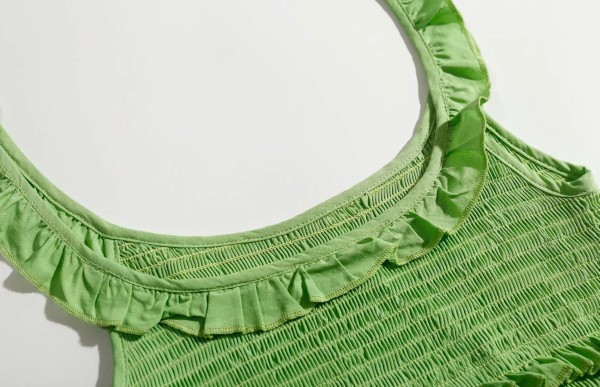 Kratka majica bez rukava od elastične tkanine i kovrča