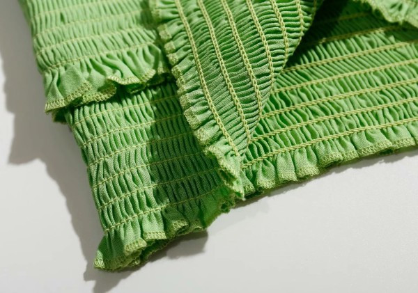 Kratka majica bez rukava od elastične tkanine i kovrča