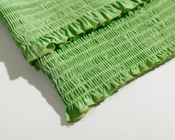 Kratka majica bez rukava od elastične tkanine i kovrča