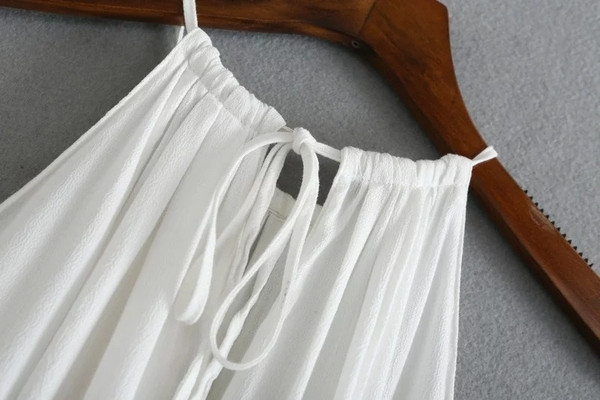 Ženska široka majica bez rukava s resicama i tankim naramenicama