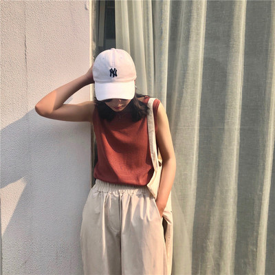 Ženski top s ovalnim izrezom