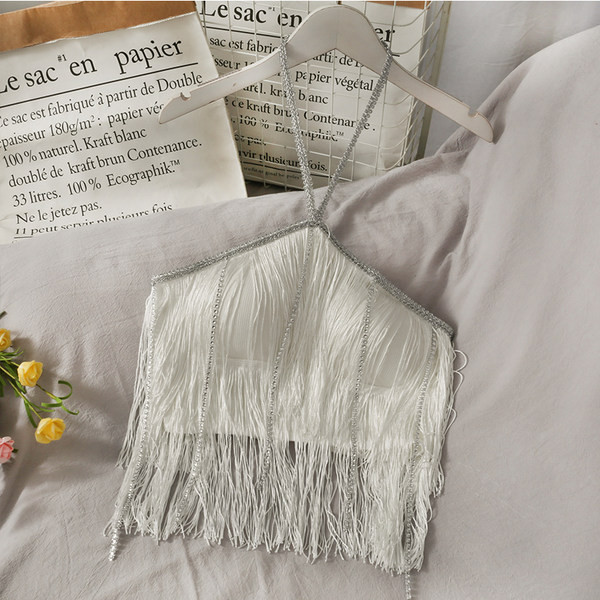 Moderan ženski top s rubovima u bijeloj i crnoj boji