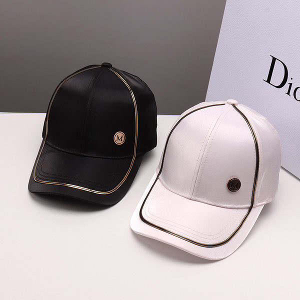 Pălărie de damă în alb și negru cu vizor