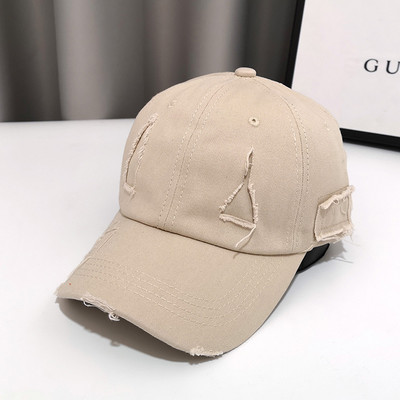 Γυναικείο καπέλο με γείσο και σκισμένο σχέδιο