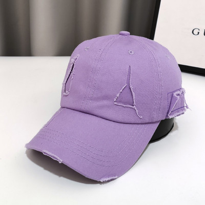 Γυναικείο καπέλο με γείσο και σκισμένο σχέδιο