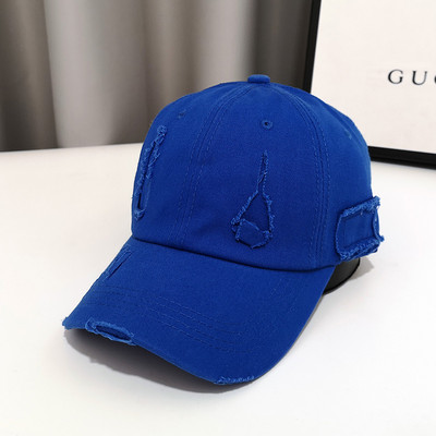 Γυναικείο καπέλο με γείσο και σκισμένο σχέδιο