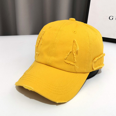 Γυναικείο καπέλο με γείσο και σκισμένο σχέδιο