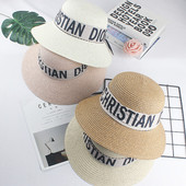 Pălărie de damă cu inscripții - potrivită pentru plajă