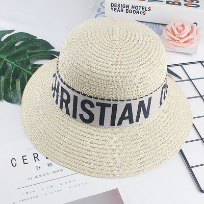 Pălărie de damă cu inscripții - potrivită pentru plajă