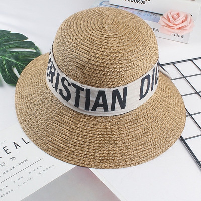 Pălărie de damă cu inscripții - potrivită pentru plajă