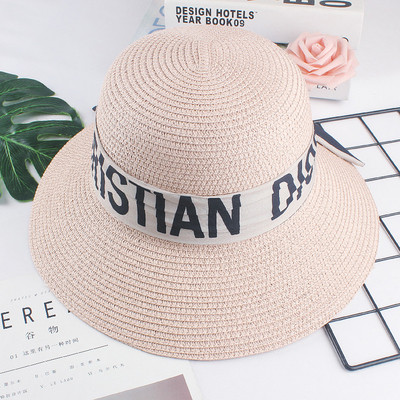 Pălărie de damă cu inscripții - potrivită pentru plajă