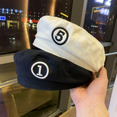 Moderna ženska kapa s vezom - tip beretke