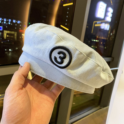 Moderna ženska kapa s vezom - tip beretke