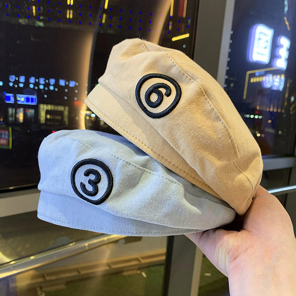 Moderna ženska kapa s vezom - tip beretke