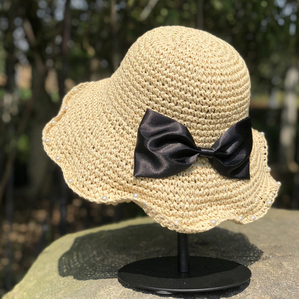 Palarie de dama decorata cu perle si panglica