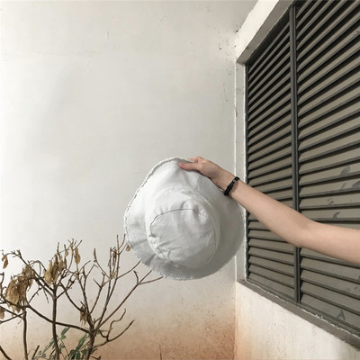 Γυναικείο καπέλο με σκισμένο μοτίβο