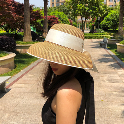 Κομψό γυναικείο καπέλο με περιθώριο και κορδέλα