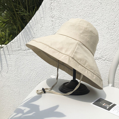 Γυναικείο υφασμάτινο καπέλο με περιφέρεια