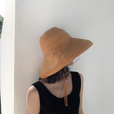 Γυναικείο υφασμάτινο καπέλο με περιφέρεια