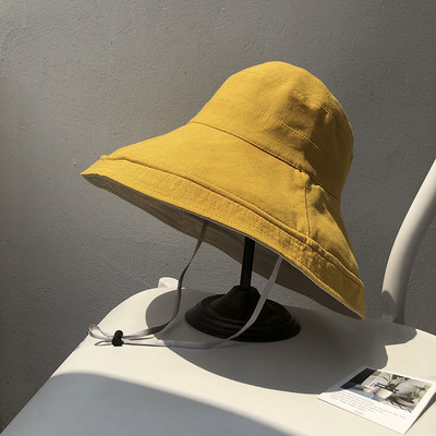 Γυναικείο υφασμάτινο καπέλο με περιφέρεια