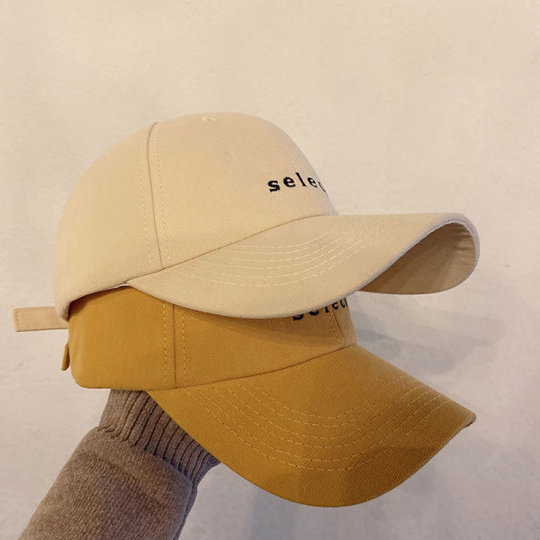 Pălărie textilă de damă cu vizor și inscripție