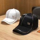 Ženska bejzbol kapa sa šiltom i metalnim elementom