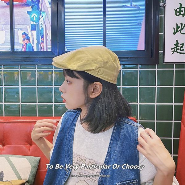 Beretă textilă de damă cu emblemă