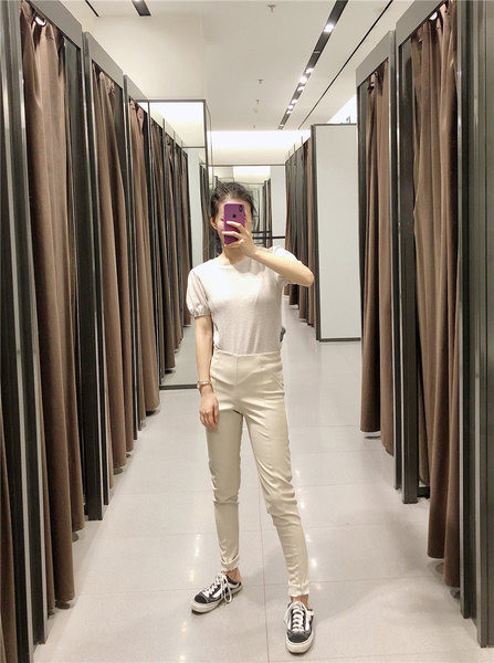 Ženske moderne hlače od eko kože sa patentnim zatvaračima