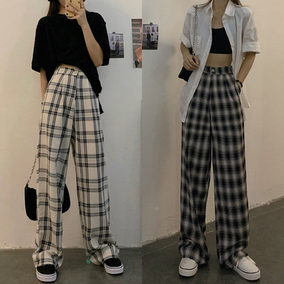 Women`s plaid pants with high waist pockets and wide legs