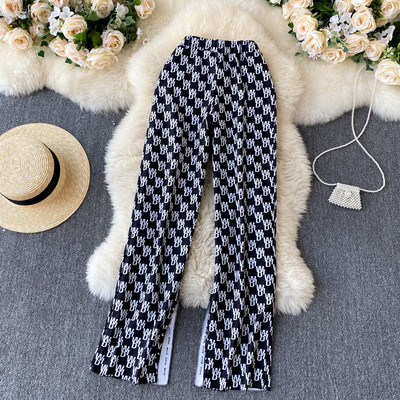 Pantaloni de dama cu talie inalta in alb-negru