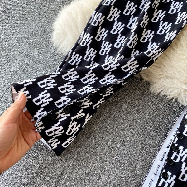 Pantaloni de dama cu talie inalta in alb-negru