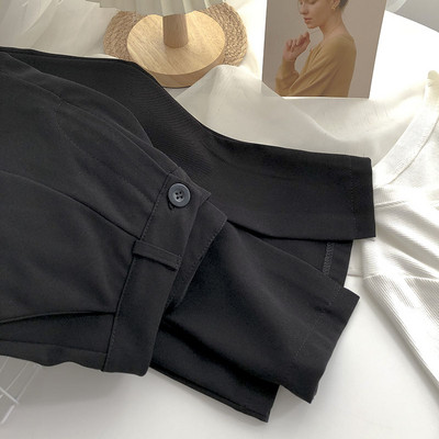 Pantaloni de dama cu nasturi si crapaturi