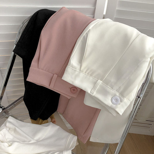 Pantaloni de dama cu nasturi si crapaturi