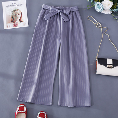 Moderni ženski model hlača na pruge širok