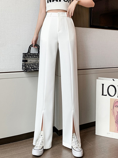 Moteriškos plataus modelio kelnės su sagomis ir skeltukais ant kojų