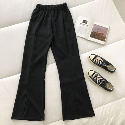 Pantaloni de dama cu crapaturi si talie elastica