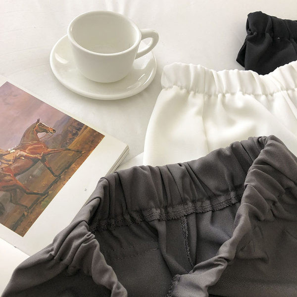 Pantaloni de dama cu crapaturi si talie elastica